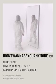 a person in white is looking into a mirror with the words, i don't wanna