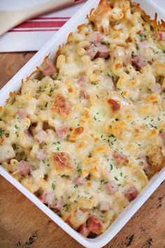 a casserole dish with ham and cheese