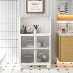 a bathroom with a sink, toilet and cabinet in it's center area is shown