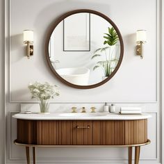 a bathroom with a round mirror above the sink and a wooden cabinet below it,