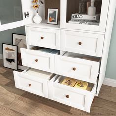 a white cabinet filled with lots of drawers