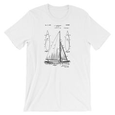 Sailboat Patent T-Shirt. Vintage patent art from the archives of the United States Patent Office.100% Super Soft Combed and Ringspun Cotton  Slightly Fitted Men's/Unisex TeeFeels and fits like a well-loved favorite teePrinted on super soft Bella Canvas Tee.Available printed on Black, Red, White, or Gray T-Shirt.Sizes S, M, L, XL, 2XL, 3Xl**Please check sizing chart to determine your best fit (in product photos.)**The shirt is digitally printed with water based inks for a soft feel.Each shirt is Graphic Print Crew Neck T-shirt For Sailing, Nautical White T-shirt With Graphic Print, Nautical Graphic Print Tops For Sailing, Sail Colored Nautical T-shirt With Graphic Print, Sail Color Nautical T-shirt With Graphic Print, Nautical Graphic Print T-shirt In Light Blue, Crew Neck Graphic T-shirt For Sailing, Crew Neck T-shirt With Graphic Print For Sailing, Crew Neck Graphic Print Top For Sailing