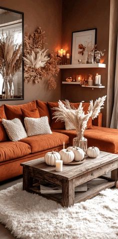 Burnt Orange And Green Living Room, Extendable Tables, Thanksgiving Table Setup, Brown Leather Couch Living Room, Tan Leather Couch, Orange Living Room, Orange Couch, Lights Decorations, Storage Ottomans