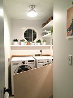 a washer and dryer in a small room