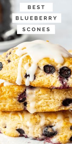 three blueberry scones stacked on top of each other