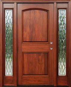 a wooden door with stained glass panels on the front and side doors are made of wood