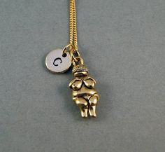 Venus of Willendorf Necklace, Woman of Willendorf, goddess fertility, antique gold, initial necklace Symbolic Personalized Brass Charm Necklaces, Personalized Symbolic Brass Charm Necklaces, Personalized Brass Charm Necklaces, Venus Of Willendorf, Necklace Woman, Gold Initial Necklace, Gold Initial, Cat Necklace, Losing A Pet