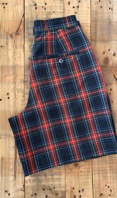 "Awesome high waisted 90's plaid shorts. High waisted fit, looser through the hips, two front pockets, one back pocket. Button and zipper closure. Classic red plaid pattern. Shorts are in excellent clean condition with very little to no signs of previous wear. Measurements are taken zipped or buttoned up and laid comfortably flat then x 2 for total circumference (inches) Gap Tag Size 5/6 100% Cotton Waist 26\" Hips 42\" Length 19\" Inseam 8\" Rise 12.5\" Bottom leg Opening Circumference 26\" All Plaid Bottoms With Built-in Shorts, High-waisted Plaid Bottoms With Built-in Shorts, Preppy Short-length Bottoms With Pockets, Casual High Waist Plaid Shorts, Retro Plaid Short Bottoms, Retro Plaid Short-length Bottoms, Preppy Plaid Short Bottoms, Levi High Waisted Shorts, Plaid Clothing