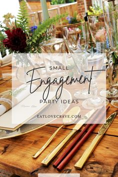 a wooden table topped with lots of glasses and place settings for a small engagement party