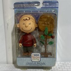 the peanuts movie charlie brown action figure is in its package for sale at toys r us