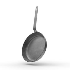 an empty frying pan on a white background with clippings to the side