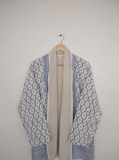 "Blue And White Kantha Jacket, Kantha Quilt Jacket, Kantha Overcoat, Women's Jacket, Winter Coat, Indian Kantha Jacket, Beautiful Kantha Coat, Festival Fashion Jacket, Pure Cotton Jacket, Gift For Mom Size:-One size (plus) US women's letter Measurements: Length: 30\" Inches Bust : 44\" Inches Sleeve : 24\" Inches Fabric - 100% Cotton Color : Same As Picture Kantha Jacket made with kantha quilt fabric which is fresh and new. This kantha fabric is hand stitched and it is the specialty of this piec Open Front Cotton Outerwear For Winter, Winter Cotton Open Front Outerwear, White Casual Kimono For Winter, White Cotton Open Front Outerwear, White Open Front Cotton Outerwear, Blue Casual Kimono For Winter, Casual Blue Kimono For Winter, Blue Casual Winter Kimono, Embroidered Open Front Outerwear For Fall