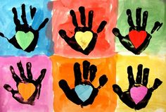 four handprints with hearts on them in different colors and shapes, all drawn by children