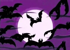 bats flying in front of a full moon with purple sky and clouds behind them,