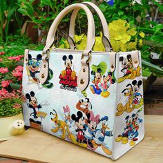 Mickey mouse luxury handbag leather bag for womenProduct Information:Manufactured with premium water-resistant PU leather.Size: ~11.4*7.9*4.1in (29*20*10.5 cm).Features comfortable and sturdy~29in (74cm)carrying straps, Custom Leather Bag, Leather Bag For Women, Mouse Pictures, Mickey Mouse Pictures, Printed Handbags, Handbag Leather, Disney Christmas, Disney Fun, Everyday Items