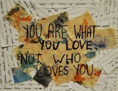 the words you are what you love, not who loves you written on torn paper