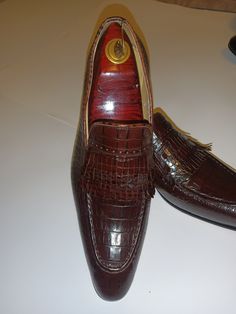 Men new handmade brown colored alligator embossed leather with flap. These classic comfortable loafers are perfect to wear with a suit, slacks or even jeans. Look professional and chic at the office with these essential loafers. Please remember all leather is hand stained and colors may vary slightly. Brown Crocodile Pattern Leather Shoes For Semi-formal Occasions, Brown Crocodile Pattern Leather Shoes For Semi-formal, Office Dress Shoes With Brown Crocodile Pattern, Brown Crocodile Pattern Dress Shoes For Office, Luxury Brown Tassel Loafers For Business, Brown Crocodile Pattern Loafers For Semi-formal Occasions, Brown Crocodile Pattern Wingtip Loafers, Brown Crocodile Pattern Dress Shoes For Business, Brown Leather Shoes With Crocodile Pattern For Business