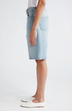 A low-rise waist and longline silhouette define nonstretch denim shorts crafted from organic cotton with a logo-embossed back patch. 8 1/2" inseam; 22" leg opening; 15" front rise; 16 1/2" back rise (size 29) Zip fly with button closure Front slant pockets; back patch pockets 100% organic cotton Machine wash, dry flat Made in Italy Designer Clothing This brand has B Corp certification, representing business practices with emphasis on social and environmental performance, accountability and trans Classic Jean Shorts With Five Pockets, Classic Five Pocket Jean Shorts, Fitted Jean Shorts With Five Pockets, Denim Blue Recycled Denim Shorts, Light Wash Cotton Bermuda Shorts With Straight Leg, Spring Recycled Denim Jean Shorts, Loulou Studio, Back Patch, Emphasis