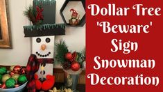 dollar tree sign snowman decoration with red and green ornaments