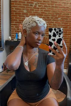 22 Short Haircuts For Black Women with Round Faces: Flattering Looks in 2023 Short Hairstyles On Round Faces, Blonde Hair On Black Women Short, Short Blonde On Black Women, Pixie Haircut For Round Face, Pixie Haircut 4c Hair, Cute Short Hairstyles For Short Hair, Short Hair Pin Curls, Texturized Short Hair, Pixie Cut With Curls