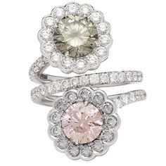 The 18k white gold flower bypass ring features a GIA 1.93-carat fancy dark greenish-gray round brilliant-cut diamond and a GIA 1.70-carat fancy brown-pink round brilliant-cut diamond. Each stone is surrounded by blue-gray and near colorless round brilliant-cut diamonds, weighing in total 2.69 carats. The ring is a size 6 1/4, and weighs 7.71 grams. Accompanied by GIA reports #1132613962 and #5121274309. A unique and beautiful statement ring. Pink Sapphire Jewelry, Pink Diamond Jewelry, Jewellery Rings, Vintage Style Rings, Bypass Ring, Jewelry Rings Diamond, Green Diamond, Bling Rings, Diamond Gold