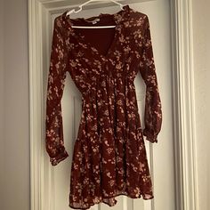 Never Worn!!! Red Dress With Long Sleeves, Ties In The Front. In Perfect Condition! Casual Burgundy Mini Dress For Spring, Casual Burgundy V-neck Mini Dress, Casual Burgundy Dress For Date Night, Red Dress With Long Sleeves, Eagle Dress, American Eagle Dress, Dress With Long Sleeves, Red Dress, American Eagle Outfitters