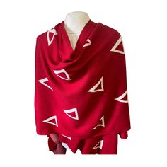 ★  DELTA SIGMA THETA KNITTED SHRUG  》A stylish knitted shrug /poncho design featuring Delta  * stretch knit fabric * Color: Red and White * material: Acrylic wool * Print: Triangle  * Size: 55X53 In. (Fits All) * Acrylic performance knit fabric manufactured in India  * Machine wash in cold water with a phosphate-free detergent, hang to dry * Get cozy in a stylish and affordable cape exclusively from our shop! * If the temperature outside is dropping, layer one of our capes over your outfit for s Delta Sigma Theta Apparel, Poncho For Women, Delta Sigma Theta Gifts, Knitted Shrug, Poncho Design, Delta Sigma Theta Sorority, Cozy Wrap, Knit Shrug, Anniversary Shirt