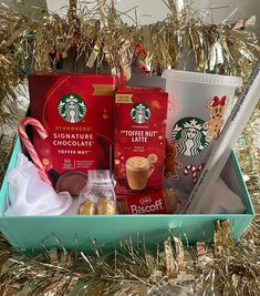 starbucks christmas gift basket with hot chocolate, candy canes and other holiday goodies