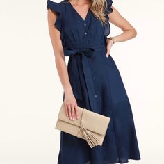 -Navy Blue Button-Up Midi Dress -Medium-Weight Woven Fabric -V-Neckline And Pleated W/ Ruffle Trim Detail -Midi Length A-Line Skirt W/ Roomy Patch Pockets Elegant Navy Button-up Dress, Navy Summer Dress With Button Closure, Blue Dress With Button Closure For Date Night, Navy Buttoned Dresses For Spring, Navy Buttoned Dress For Spring, Navy Dresses With Buttons For Spring, Navy Dress With Buttons For Spring, Elegant Navy Midi Dress With Buttons, Blue Dress With Button Closure For Brunch