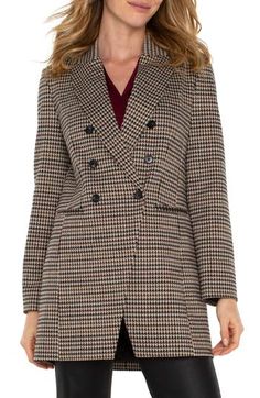 This picture-of-polish coat is crafted in a sophisticated double-breasted silhouette and covered in a classic houndstooth pattern. 33" length Double-breasted button closure Front welt pockets Unlined 73% polyester, 23% rayon, 4% spandex Machine wash, tumble dry Imported Tailored Houndstooth Business Outerwear, Tailored Houndstooth Outerwear For Business, Elegant Winter Houndstooth Outerwear, Double-breasted Herringbone Outerwear For Business, Double-breasted Herringbone Business Outerwear, Winter Houndstooth Blazer With Notch Lapel, Winter Business Tweed Jacket With Houndstooth Pattern, Houndstooth Tweed Jacket With Lapel Collar For Work, Wool Houndstooth Outerwear For Business Casual