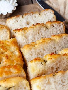 slices of bread sitting on top of a cutting board