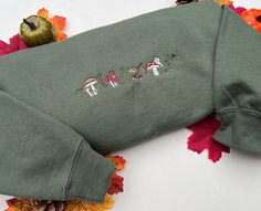 Foraging Embroidered Sweatshirt / Tee 🍄 🍂 Message if you would like this design on a T-Shirt 👇 Please read before ordering 👇 Processing time is 3-7 Days, up to 2 weeks during busier periods. Please make sure before you order that you understand the processing time, your order may be shipped at any point during this period, processing time does not include shipping time! We're only a two person team. Thanks for your understanding 💓 - Sweatshirt super soft Polycotton blend - Sizes S - 3XL+ Don't hesitate to contact us here or on Insta @retroreveriestudio ✨ We do not accept returns, if you have a query about an item please contact us Cotton Fall Sweatshirt With Mushroom Print, Cotton Sweatshirt With Mushroom Print For Fall, Cotton Crew Neck Sweatshirt With Mushroom Print, Fall Mushroom Design Crew Neck T-shirt, Fall Crew Neck T-shirt With Mushroom Design, Cotton T-shirt With Mushroom Design For Fall, T-shirt Broderie, Embroidered Sweatshirt, Fall Sweatshirt