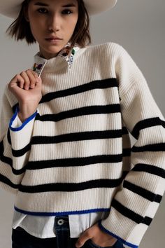 Introducing our Black Striped Jumper with Blue Stripe Detail on the Bottom, a comfortable and stylish sweater perfect for adding a touch of casual elegance to your outfit. This sweater is crafted from a very soft knitted fabric, ensuring a cozy and comfortable feel.  The striped design features black stripes with a contrasting blue stripe detail on the bottom, adding a pop of color and visual interest to the sweater. It brings a modern and playful element to the classic striped pattern. With its Oversize Pullover, Pull Oversize, Stylish Sweaters, Oversized Pullover, Cool Vintage, Casual Elegance, Vintage Jeans, Large White, Casual Wardrobe