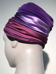 For Sale on 1stdibs - A gorgeous 1950s turban-styled hat in purple velvet, purple satin and burgundy satin with a rhinestone and pearl brooch at front. No maker label present. Purple Fitted Turban For Parties, Fitted Purple Turban For Parties, Adjustable Purple Headband For Evening, Fitted Purple Party Turban, Adjustable Purple Headwrap For Party, Adjustable Purple Headwrap For Parties, Elegant Purple Headband For Evening, Evening Hat, Velvet Purple