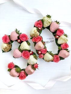 two wreaths made out of doughnuts and flowers