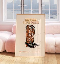 a poster with a cowboy boot on it in front of a window