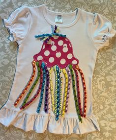 a child's t - shirt with an octopus on it