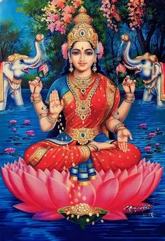 the hindu goddess sitting on top of a lotus