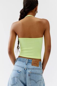 Out From Under Clara Seamless Contour Halter Top | Urban Outfitters Stretch Green Halter Top With Built-in Bra, Fitted T-back Tops For Spring, Stretch Seamless Racerback Halter Top, Seamless High Stretch Halter Neck Top, Solid Color Halter Neck Top With Built-in Bra, Trendy Solid Halter Top With Built-in Bra, Seamless High-stretch Halter Neck Tops, Fitted Solid Halter Top For Spring, Casual Halter Neck Tops With High Stretch