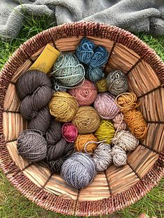 yarn in a basket on the grass