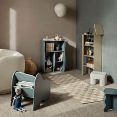 a child's room with toys and bookshelves