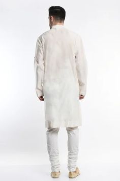 Shop for Samant Chauhan Ivory Cotton Silk Full Sleeve Pintuck Kurta Set for Men Online at Aza Fashions Off White Long Sleeve Cotton Kurta, Cream Fitted Long Sleeve Kurta, Transitional Long Sleeve Cotton Sherwani, Cream Cotton Traditional Wear With Long Sleeves, Cream Long Sleeve Cotton Traditional Wear, White Cotton Sherwani With Long Sleeves, White Cotton Sherwani, Cream Long Sleeve Kurta For Transitional Season, White Cotton Long Sleeve Sherwani