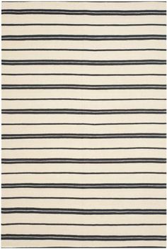 a rug with blue and white stripes on it