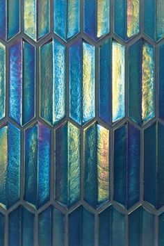 an image of stained glass tiles that look like hexagonals