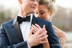 a man in a tuxedo and woman in a dress