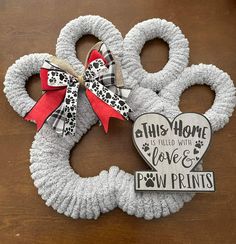 this home is filled with love and paw prints door hanger, wreath ornament