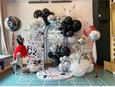 a birthday party with balloons and decorations