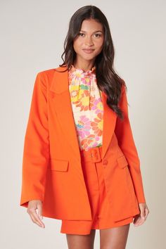 This fitted blazer is everything you'll ever want to wear. It's the perfect seasonless style that features a notch lapel with a single button closure and two hidden pockets. Self: 80% Polyester 16% Viscose 4% SpandexLining: 95% Polyester 5% Spandex Bust Waist Length Sleeve Length XSmall 37 inches 35 inches 27 inches 23 inches Small 38 inches 36 inches 28 inches 25 inches Medium 40 inches 38 inches 29 inches 25 inches Large 42 inches 40 inches 29 inches 25 inches We measure each item from side se Power Moves, Pant Suits, Workout Moves, Orange Crush, Fitted Blazer, Dressy Outfits, High Waisted Shorts, Color Orange, Women's Blazer