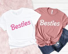 Best Friends T-Shirt, Pink Besties Shirt, Best Friend Matching Shirt, Best Friend Vacation Shirt, Funny Girls Party, Bestie Gift for Sister Our stylish, modern and specially designed t-shirts will be the perfect gift for your best friends. Let's make your friends happy 😊 Price is per shirt, not as a matching set ❀DETAIL❀ For printing, we use Bella Canvas and Gildan SoftStyle brand shirts, which are the best in the industry. *Bella Canvas -unisex size -4.2 oz. -Solid colors are 100% Combed Cotton and Ring-Spun Cotton. -Athletic Heather 90% Combed and Ring-Spun Cotton, 10% Polyester -All Heather CVC Colors 52% Combed and Ring-Spun, 48% Polyester *Gildan SoftStyle -unisex size -Sport Gray : 4.5 oz/yd² | 90% Ring Cotton / 10% Polyester -Heather Navy, Heather Maroon, Heather Galapagos Blue, Da Unisex Pink Top With Custom Print, Pink Band Merch Top With Custom Print, Pink Besties, Best Friend Matching, Best Friend T Shirts, Friend Vacation, Friends T Shirt, Funny Girls, Best Friend Shirts