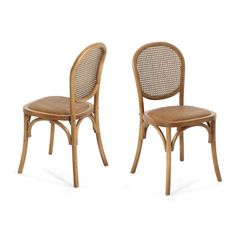 two wooden chairs side by side on a white background